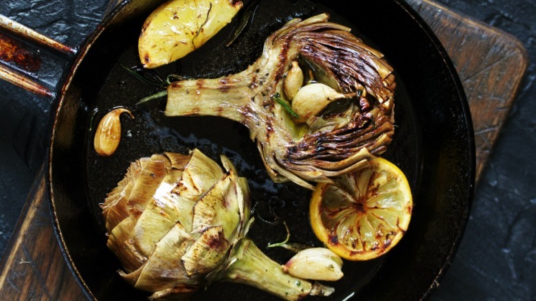 Grilled artichokes in a pan