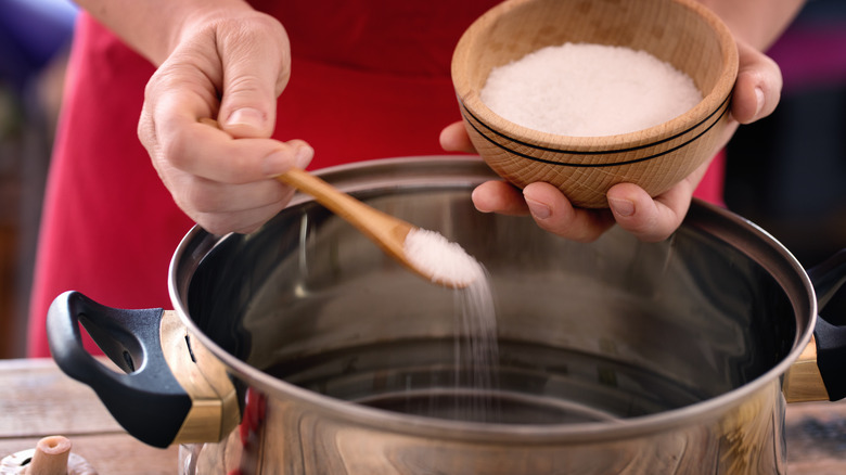 Salting a pan of water