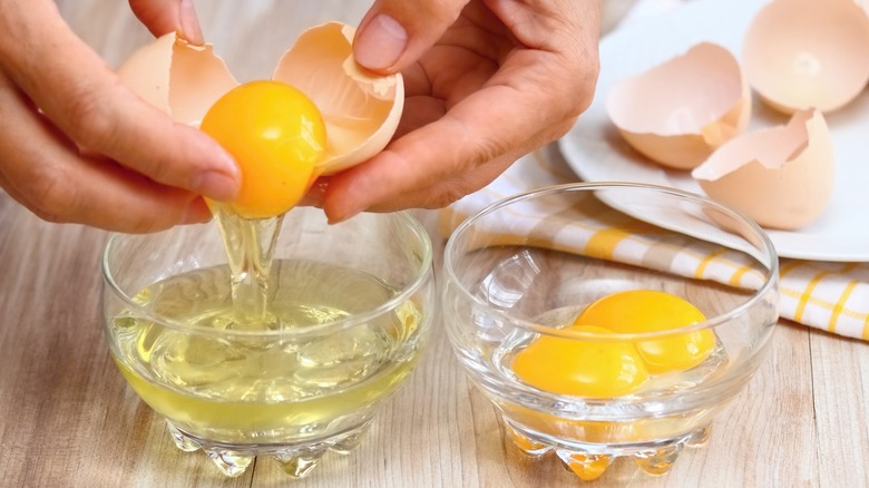 Person separating eggs