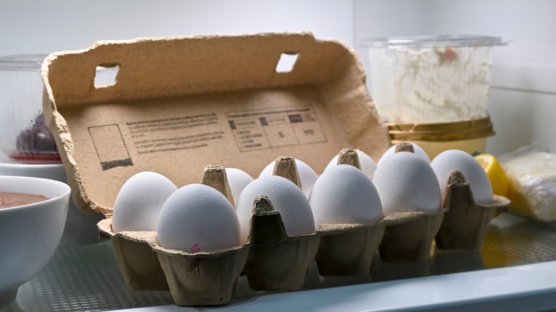 Carton of eggs in fridge