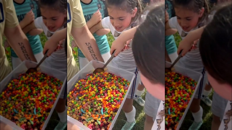 mixing candy salad