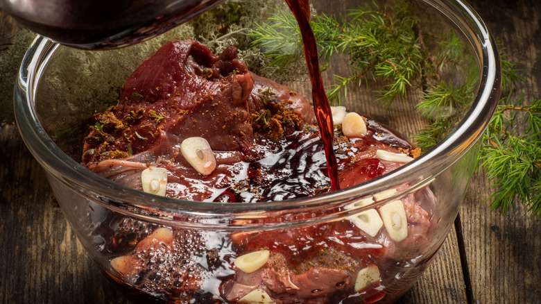 Meat marinating in red-wine sauce