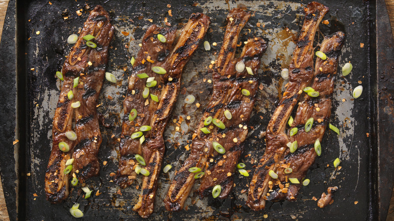 marinated kalbi with garnishes