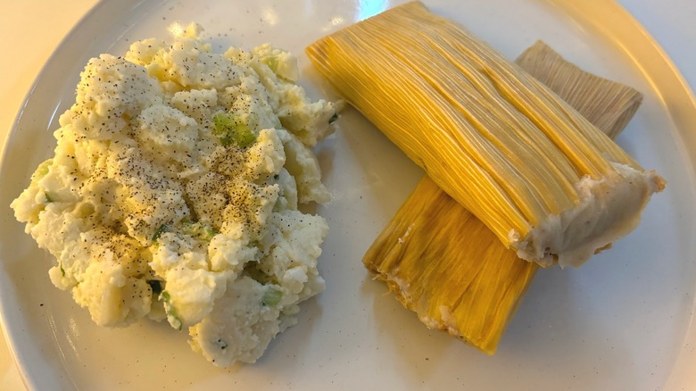 trader joes potato salad and tamales on table