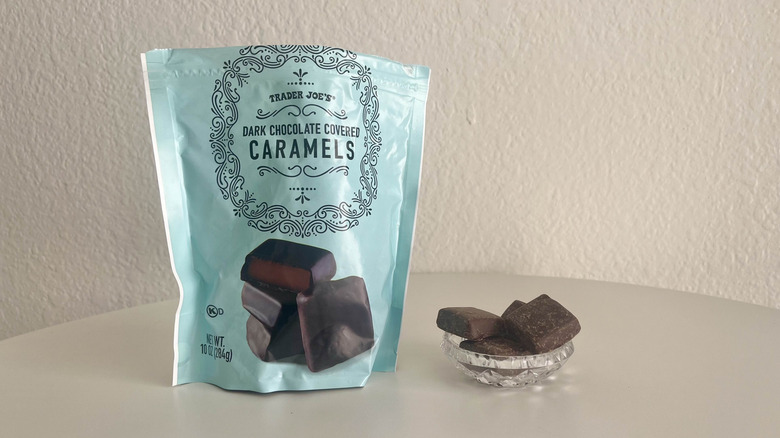 trader joe's dark chocolate caramels in a small glass dish