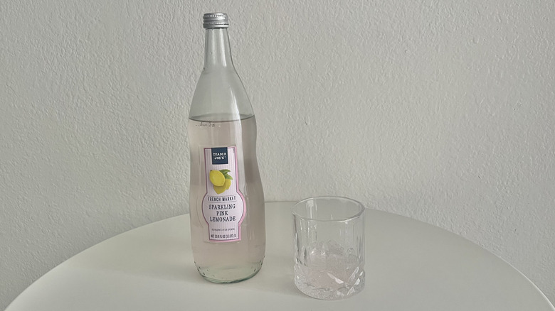 sparkling pink lemonade from trader joe's on white table