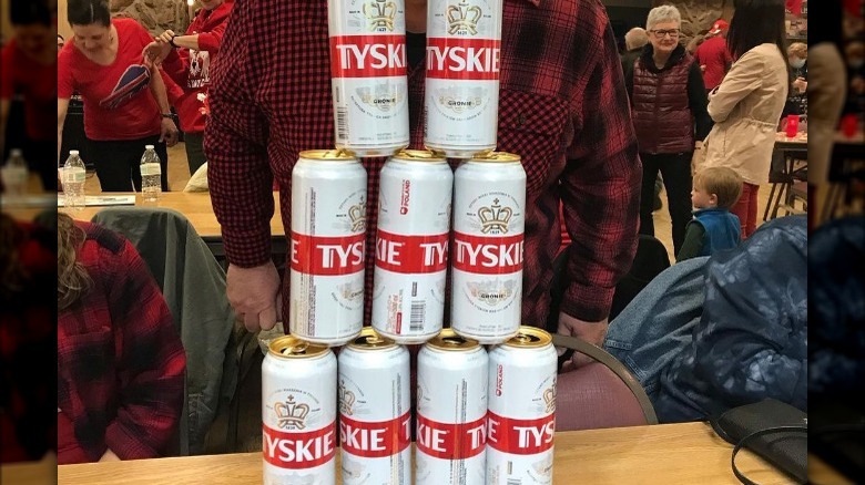 Pyramid of Tyskie beer cans