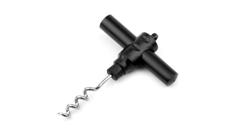 Pocket corkscrew against white