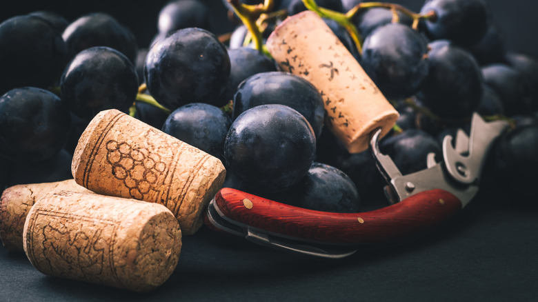 Waiter's corkscrew and grapes