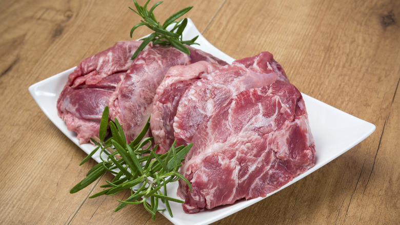 Pork cheeks on a plate