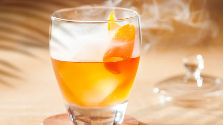 Smoked old fashioned in cocktail glass