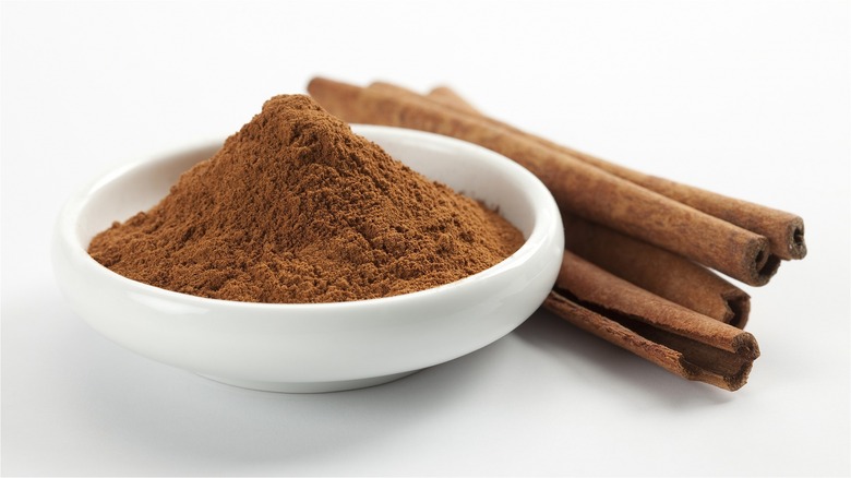 Ground cinnamon and sticks