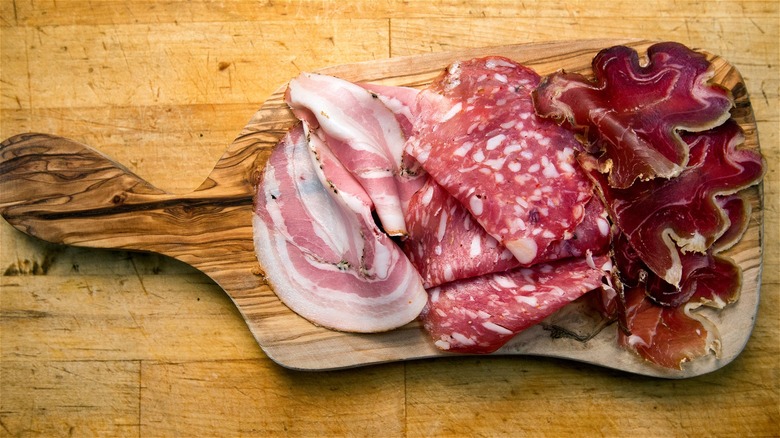 Cured meats on cutting board