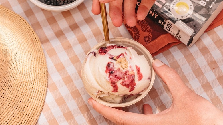 Ice cream scoop and blackberries