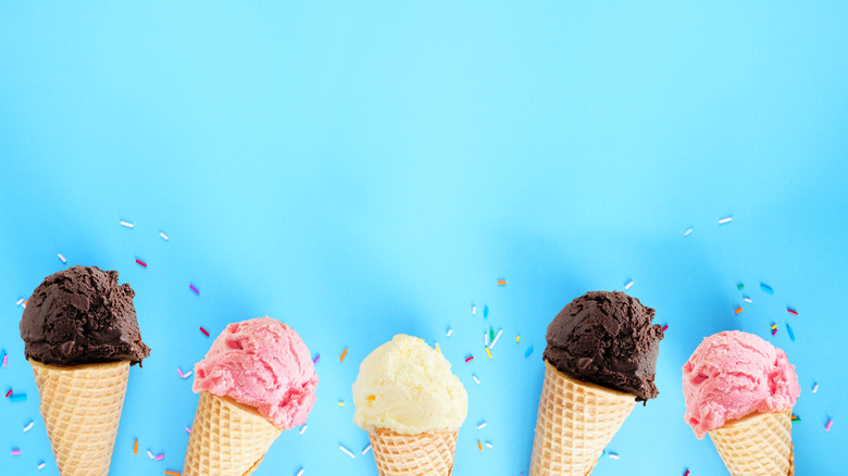 Chocolate, vanilla, strawberry ice cream cones