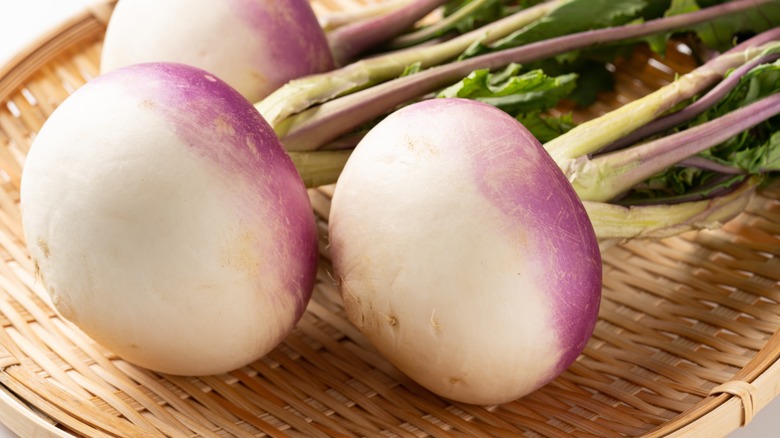 Cutting board with fresh turnips