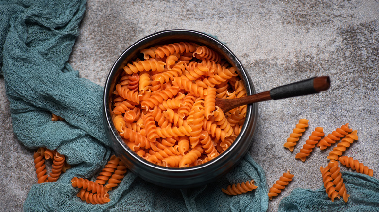 Orange spiral pasta noodles