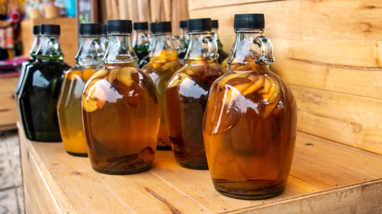 bourbon bottles infused with fruit