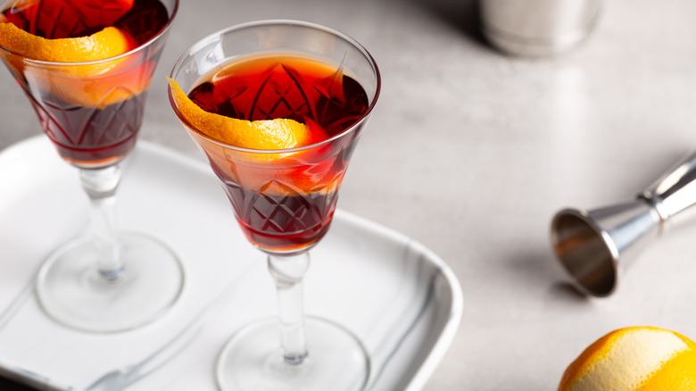 Boulevardiers garnished with orange