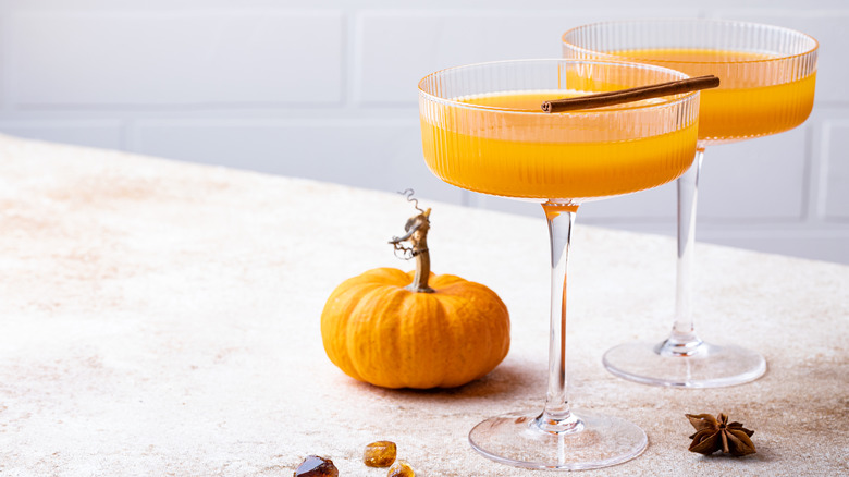 two bourbon-infused pumpkin cocktails