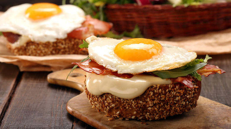 Fried egg sandwiches wood boards