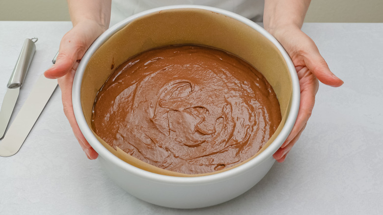 Unbaked cake batter in pan