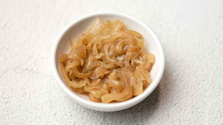 Caramelized onions on white plate