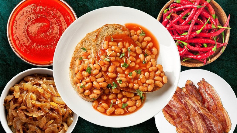 plate of beans on toast surrounded by other ingredients