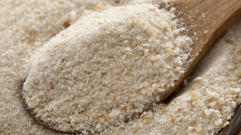 Bread crumbs on wooden spoon