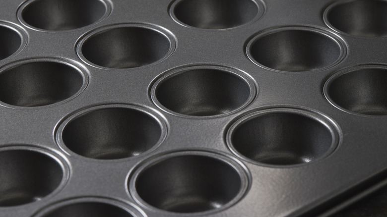 empty grey muffin tin