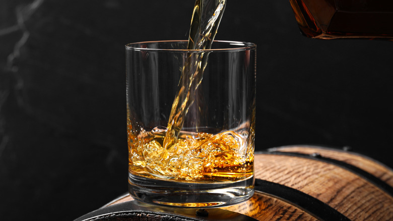 bourbon cascading into a glass