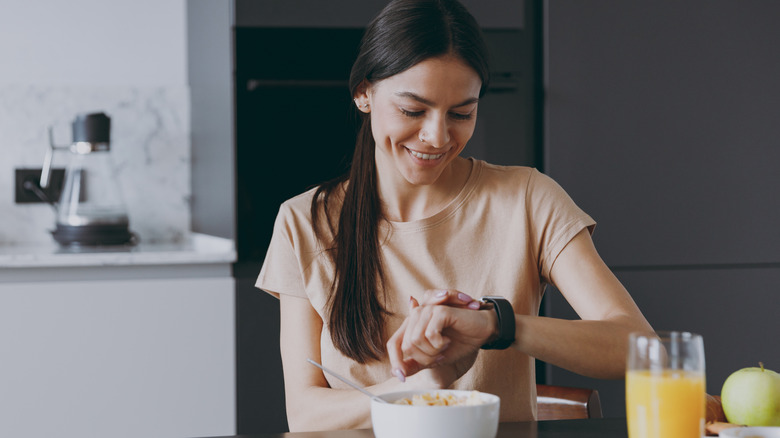 Women looking at watch