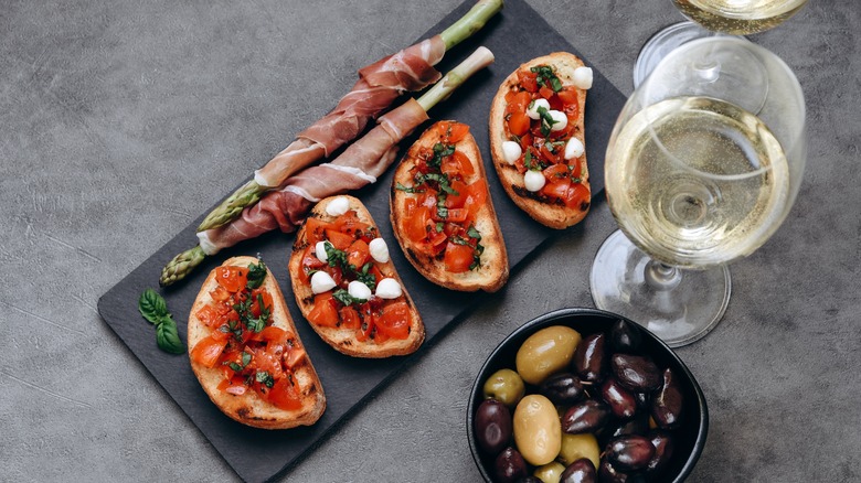 bruschetta and antipasti with prosecco