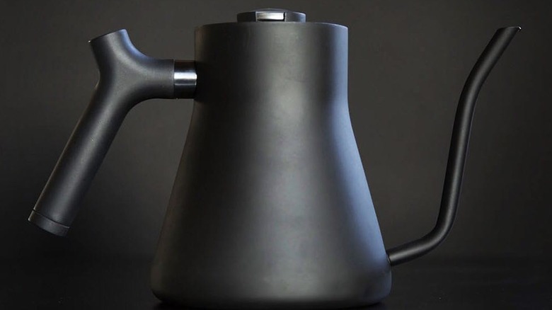 Black Fellow Stagg electric kettle against black background