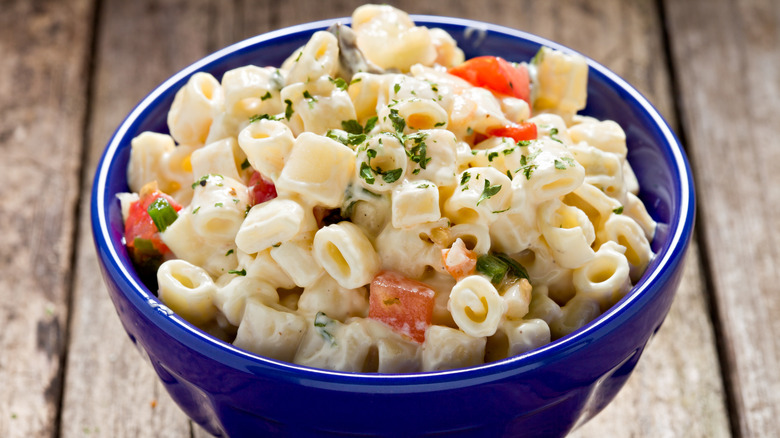 Blue bowl of macaroni salad