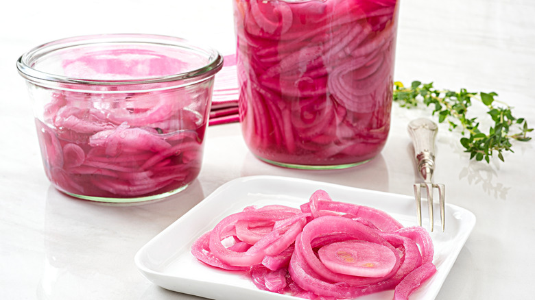 Pickled red onions in container