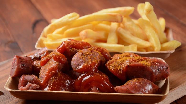 Currywurst ketchup sausage and fries