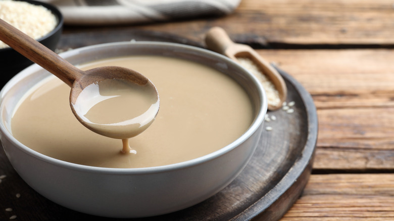 Tahini spooned out of bowl