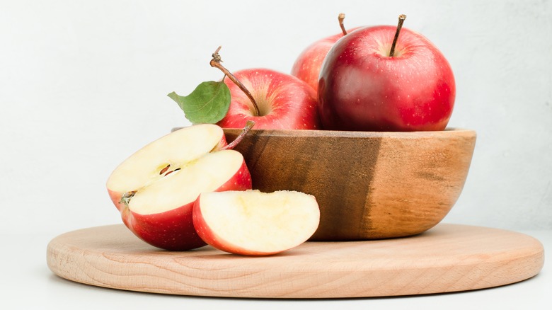 Apples sliced whole in bowl