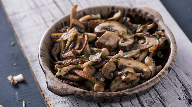 Cooked mushrooms ceramic bowl