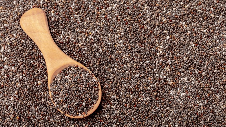 chia seeds with wooden spoon