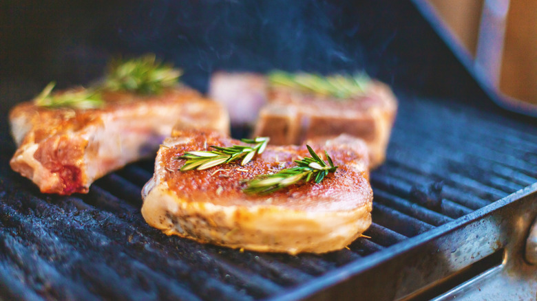 Pork chops on a grill