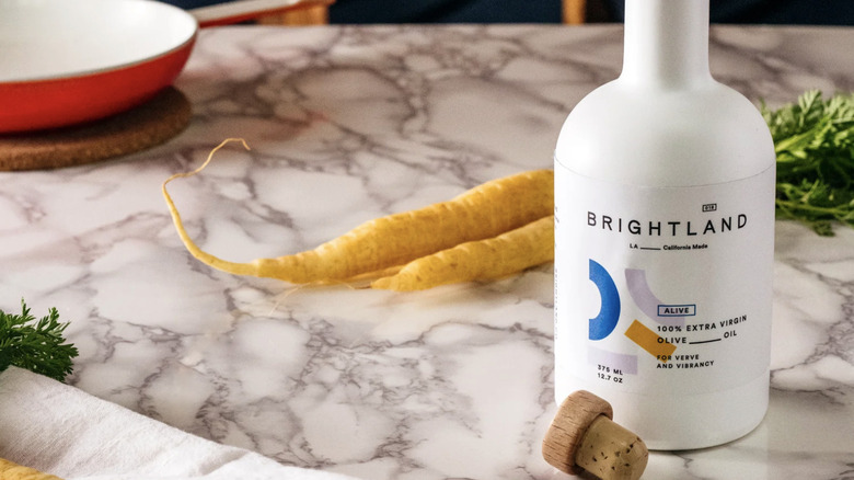 Brightland Alive EVOO on marble counter