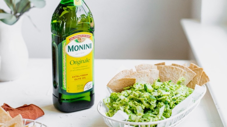 Monini Originale EVOO next to chips