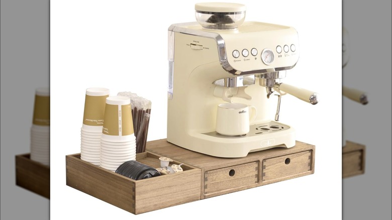 A wood coffee station organizer is on display