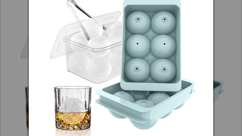 The Wibimen ice cube trays are shown in front of a container of large, round cubes