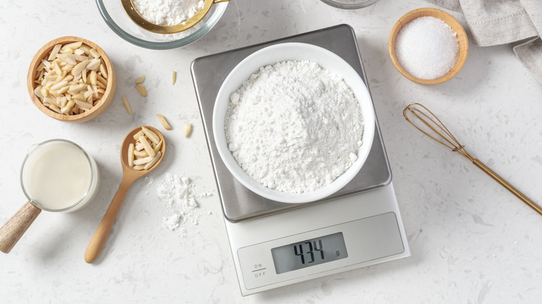 Bowl of flour on kitchen scale.