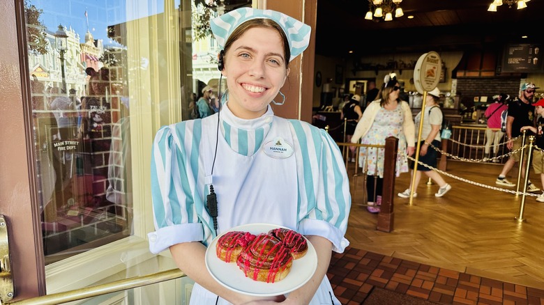 Cast member with Cinnamon Roll