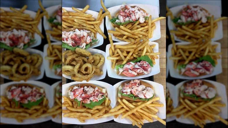 Lobster rolls served with various sides