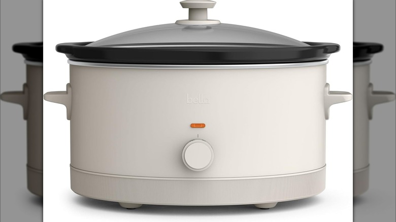 large Bella brand slow cooker in oatmilk color on white background